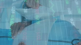 Animation of trading board and graphs over diverse senior doctor explaining coworkers over tablet. Digital composite, multiple exposure, medical, healthcare, investment, report, teamwork, technology. - Powered by Shutterstock - Get 15% off with code: PIKWIZARD15
