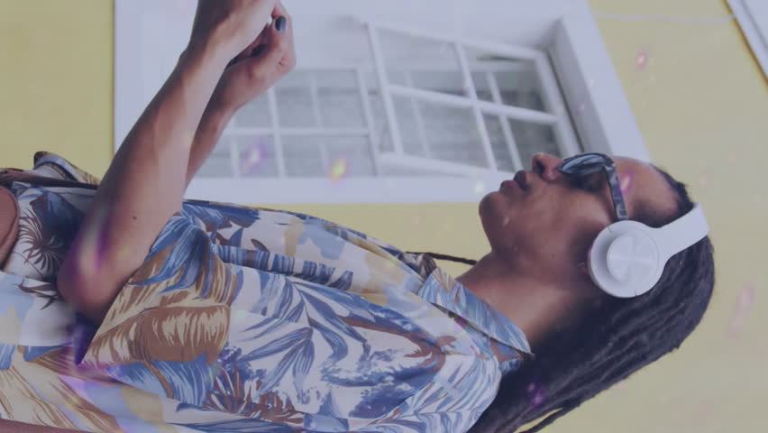 Animation of round scanner and light trails over african american man using a smartphone on street. Global networking and business technology concept - Powered by Shutterstock - Get 15% off with code: PIKWIZARD15