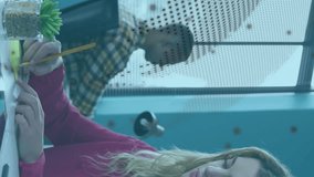 Animation of rotating globe and computer language over caucasian woman analyzing reports. Digital composite, multiple exposure, globalization, coding, programming language and technology concept. - Powered by Shutterstock - Get 15% off with code: PIKWIZARD15