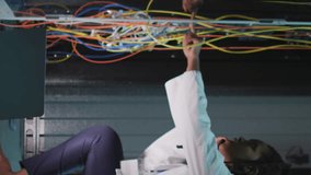 Animation of data processing over african american female engineer using laptop at server room. Computer interface and business data storage technology concept - Powered by Shutterstock - Get 15% off with code: PIKWIZARD15