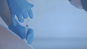 Animation of digital icons data processing over caucasian female doctor vaccinating woman. Global medicine, computing, digital interface and data processing concept digitally generated video. - Powered by Shutterstock - Get 15% off with code: PIKWIZARD15