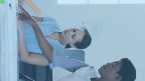 Animation of financial data processing over diverse business people in office. Global finance, business, connections, computing and data processing concept digitally generated video. - Powered by Shutterstock - Get 15% off with code: PIKWIZARD15