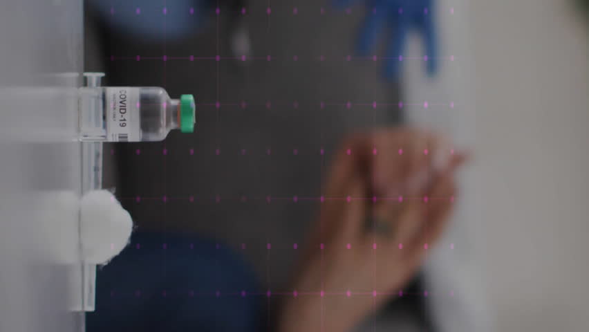 Animation of cardiograph over diverse doctor and patient. Global healthcare, medicine, lifestyle and digital interface concept digitally generated video.