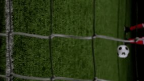 Social media notifications animation over soccer player kicking ball into goal net. Football, technology, digital, scoring, sports - Powered by Shutterstock - Get 15% off with code: PIKWIZARD15