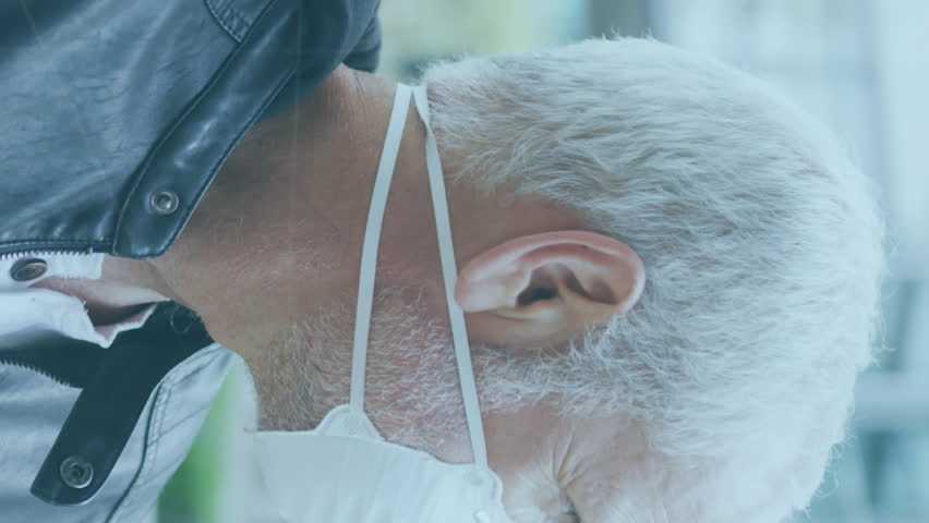 Animation of financial graph and virus icons over caucasian senior man in face mask. business, finance, covid 19 pandemic and technology concept digitally generated video. - Powered by Shutterstock - Get 15% off with code: PIKWIZARD15