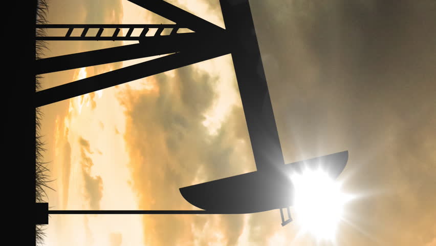 Animation of pumpjack over sun and clouds. National petroleum day and celebration concept digitally generated video.