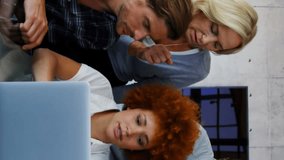 Animation of binary coding over group of students using laptop. technology, education and learning concept digitally generated video. - Powered by Shutterstock - Get 15% off with code: PIKWIZARD15