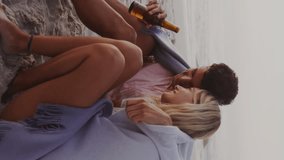 Animation of speech bubble with thumbs up and like numbers over couple having beer on beach. digital interface, social media and global networking concept digitally generated video. - Powered by Shutterstock - Get 15% off with code: PIKWIZARD15