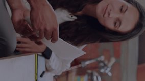 Network of digital icons against diverse male and female office colleagues discussing over document. Global networking and business technology concept - Powered by Shutterstock - Get 15% off with code: PIKWIZARD15