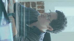 Animation of financial data processing over businessman taking notes in office. global business, data processing and digital interface concept digitally generated video. - Powered by Shutterstock - Get 15% off with code: PIKWIZARD15