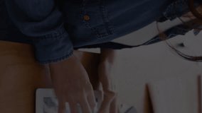 Animation of stock market data processing against woman using digital tablet at office. Computer interface and business data technology concept - Powered by Shutterstock - Get 15% off with code: PIKWIZARD15