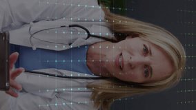 Animation of medical data processing over caucasian female doctor. Global medicine, connections, computing and data processing concept digitally generated video. - Powered by Shutterstock - Get 15% off with code: PIKWIZARD15