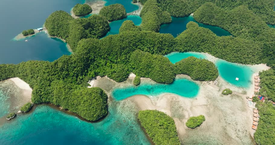 Beautiful water in lagoon in Tropical Island. Seascape with coral reefs. Sohoton Cove. Bucas Grande Island. Mindanao, Philippines.