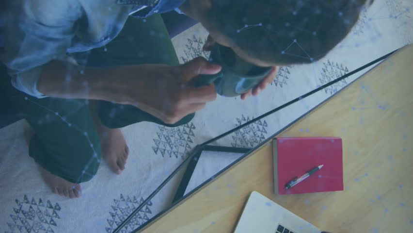 QR code scanning animation over person using smartphone and laptop on desk. Technology, digital, office, device - Powered by Shutterstock - Get 15% off with code: PIKWIZARD15