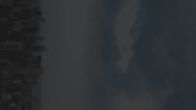 Animation of starburst effect over city skyline under cloudy sky. cityscape, urban, atmospheric, backdrop, visual, digital art - Powered by Shutterstock - Get 15% off with code: PIKWIZARD15