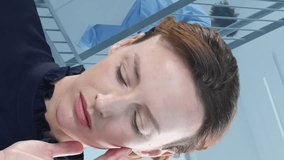 Animation of spots and caucasian woman over african american female doctor with face mask. Social media and digital interface concept digitally generated video. - Powered by Shutterstock - Get 15% off with code: PIKWIZARD15