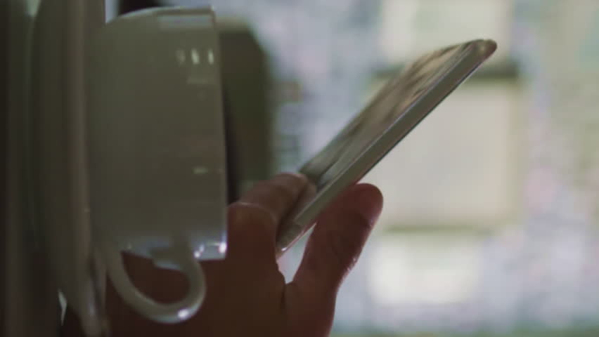 Animation of financial data processing over hands using smartphone. Global finances, business and digital interface concept digitally generated video. - Powered by Shutterstock - Get 15% off with code: PIKWIZARD15