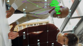 Animation of financial data processing over diverse business people working in office. Global business, finances, computing and data processing concept digitally generated video. - Powered by Shutterstock - Get 15% off with code: PIKWIZARD15