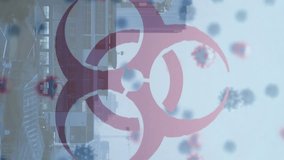 Animation of biohazard and virus cells over cityscape. global health, medicine and economy concept during coronavirus covid 19 pandemic digitally generated video. - Powered by Shutterstock - Get 15% off with code: PIKWIZARD15
