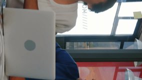 Animation of changing numbers, icons in message boxes over diverse coworkers shaking hands in office. Digital composite, multiple exposure, business, teamwork, growth and technology concept. - Powered by Shutterstock - Get 15% off with code: PIKWIZARD15