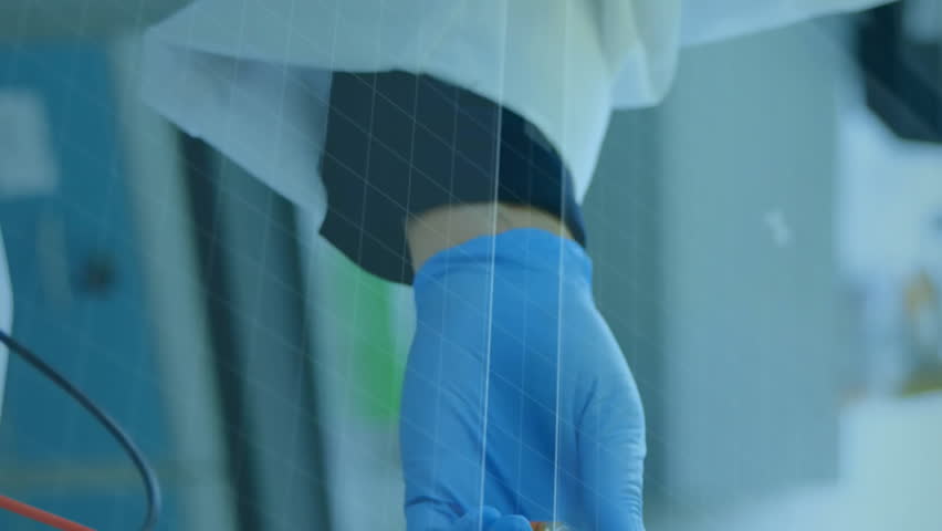 Animation of data processing and scope scanning over caucasian scientists with test tube. Global science and digital interface concept digitally generated video. - Powered by Shutterstock - Get 15% off with code: PIKWIZARD15