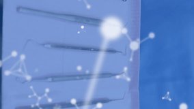 Animation of molecules over caucasian female dentist holding tools. Global medicine, healthcare and digital interface concept digitally generated video. - Powered by Shutterstock - Get 15% off with code: PIKWIZARD15
