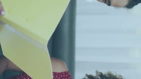 Two people discussing documents with world map and data overlay animation. Collaboration, brainstorming, meeting, teamwork, analytics, business - Powered by Shutterstock - Get 15% off with code: PIKWIZARD15