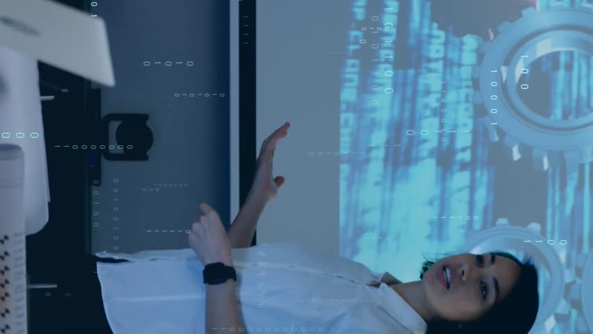 In conference room, businesswoman presenting data processing animation to colleagues. presentation, teamwork, office, collaboration, technology, analytics - Powered by Shutterstock - Get 15% off with code: PIKWIZARD15