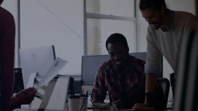 Tech team discussing designs over laptop, designer pointing layouts and neon waveforms showing data. Collaboration, innovation, brainstorming, data visualization, modern workspace, teamwork, digital - Powered by Shutterstock - Get 15% off with code: PIKWIZARD15