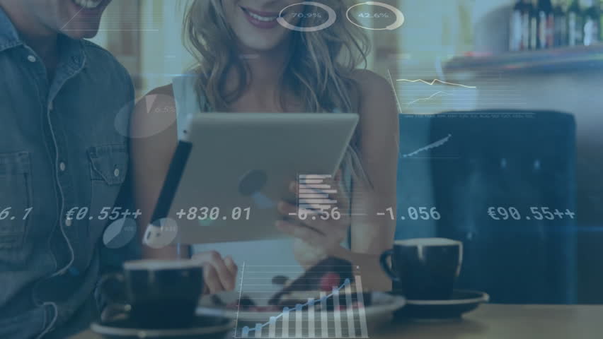 Woman holding tablet and man tapping tablet for finance review while graphs updating around them. Collaboration, technology, finance, data analysis, partnership, digital, modern - Powered by Shutterstock - Get 15% off with code: PIKWIZARD15