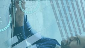 Animation of data processing over caucasian businessman using laptop. global business, finances, connections and digital interface concept digitally generated video. - Powered by Shutterstock - Get 15% off with code: PIKWIZARD15