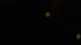 Animation of blurred traffic lights over graphs and dark space. Data processing, digital screen, network safety and technology concept digitally generated video. - Powered by Shutterstock - Get 15% off with code: PIKWIZARD15