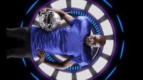 Animation of african american male rugby player over scope scanning on black background - Powered by Shutterstock - Get 15% off with code: PIKWIZARD15