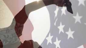 Animation of waving usa flag, confetti falling over african american man taking selfie at the beach. Independence day celebration and holiday concept - Powered by Shutterstock - Get 15% off with code: PIKWIZARD15