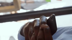 Animation of social media icons with number over african american businessman using smartphone. Global communication, social media, connections and digital interface concept digitally generated video. - Powered by Shutterstock - Get 15% off with code: PIKWIZARD15