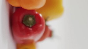 Numbers and data animation over colorful bell peppers and tomatoes. Vegetables, food, technology, analysis, nutrition, digital - Powered by Shutterstock - Get 15% off with code: PIKWIZARD15