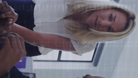 Financial data processing animation over business people working on laptop in office. Finance, teamwork, technology, analysis, corporate, computer - Powered by Shutterstock - Get 15% off with code: PIKWIZARD15