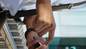 Animation of connected icons globes over midsection of man scrolling on smartphone. Digital composite, multiple exposure, communication, globalization and technology concept. - Powered by Shutterstock - Get 15% off with code: PIKWIZARD15