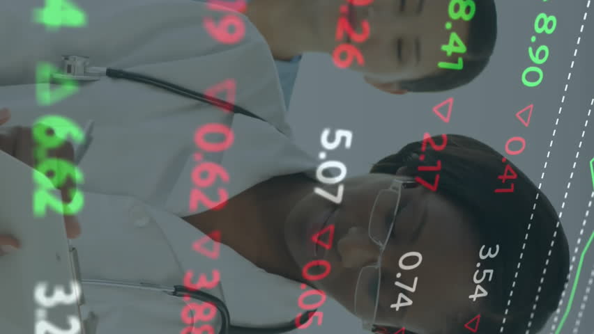 Stock market data animation over medical professionals working in hospital. Healthcare, finance, analysis, technology, business, overlay - Powered by Shutterstock - Get 15% off with code: PIKWIZARD15