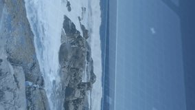 Digital interface animation over ocean waves crashing on rocky shore. Technology, sea, nature, landscape, innovation, interaction - Powered by Shutterstock - Get 15% off with code: PIKWIZARD15