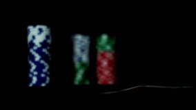 3D animation of a dimly lit gambling table with a hand holding Russian rubles and colorful poker chips in the background. Ideal for casino, money, or suspense-themed content. - Powered by Shutterstock - Get 15% off with code: PIKWIZARD15