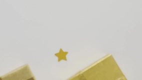 Social media notifications animation over golden gift boxes and star decorations. Christmas, celebration, holiday, presents, digital, festive - Powered by Shutterstock - Get 15% off with code: PIKWIZARD15