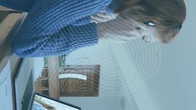 Animation of biometric fingerprint over businesswoman using phone headset and laptop. global online security, data processing, digital interface and technology concept digitally generated video. - Powered by Shutterstock - Get 15% off with code: PIKWIZARD15