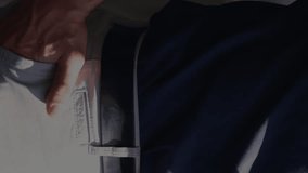 Animation of data processing over businessman using smartphone. Global finances business data processing digital interface and technology concept digitally generated video. - Powered by Shutterstock - Get 15% off with code: PIKWIZARD15