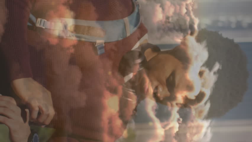 Animation of clouds over african american businessman with smartwatch. Global business and digital interface concept digitally generated video. - Powered by Shutterstock - Get 15% off with code: PIKWIZARD15