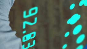 Animation of financial data processing over caucasian businessman checking smartwatch. Global business, finances, computing and data processing concept digitally generated video. - Powered by Shutterstock - Get 15% off with code: PIKWIZARD15