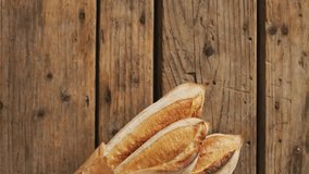 Animation of frame with fall leaves over baguettes. Nature, food and digital interface concept digitally generated video. - Powered by Shutterstock - Get 15% off with code: PIKWIZARD15