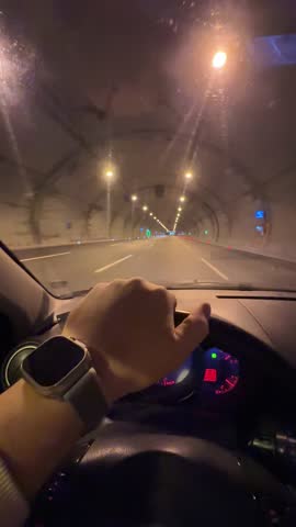 Car POV shot : Blurred motion tunnel. Shot from a slow moving car