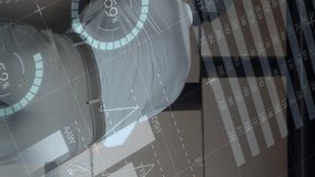 Rear view of Caucasian deliveryman unloading packages from the back of a van. Digital animation of graphs and statistics are running in the foreground - Powered by Shutterstock - Get 15% off with code: PIKWIZARD15