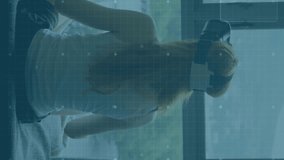 Animation of scope scanning and processor elements over woman wearing vr headset. global data processing, communication and global technology concept digitally generated video. - Powered by Shutterstock - Get 15% off with code: PIKWIZARD15